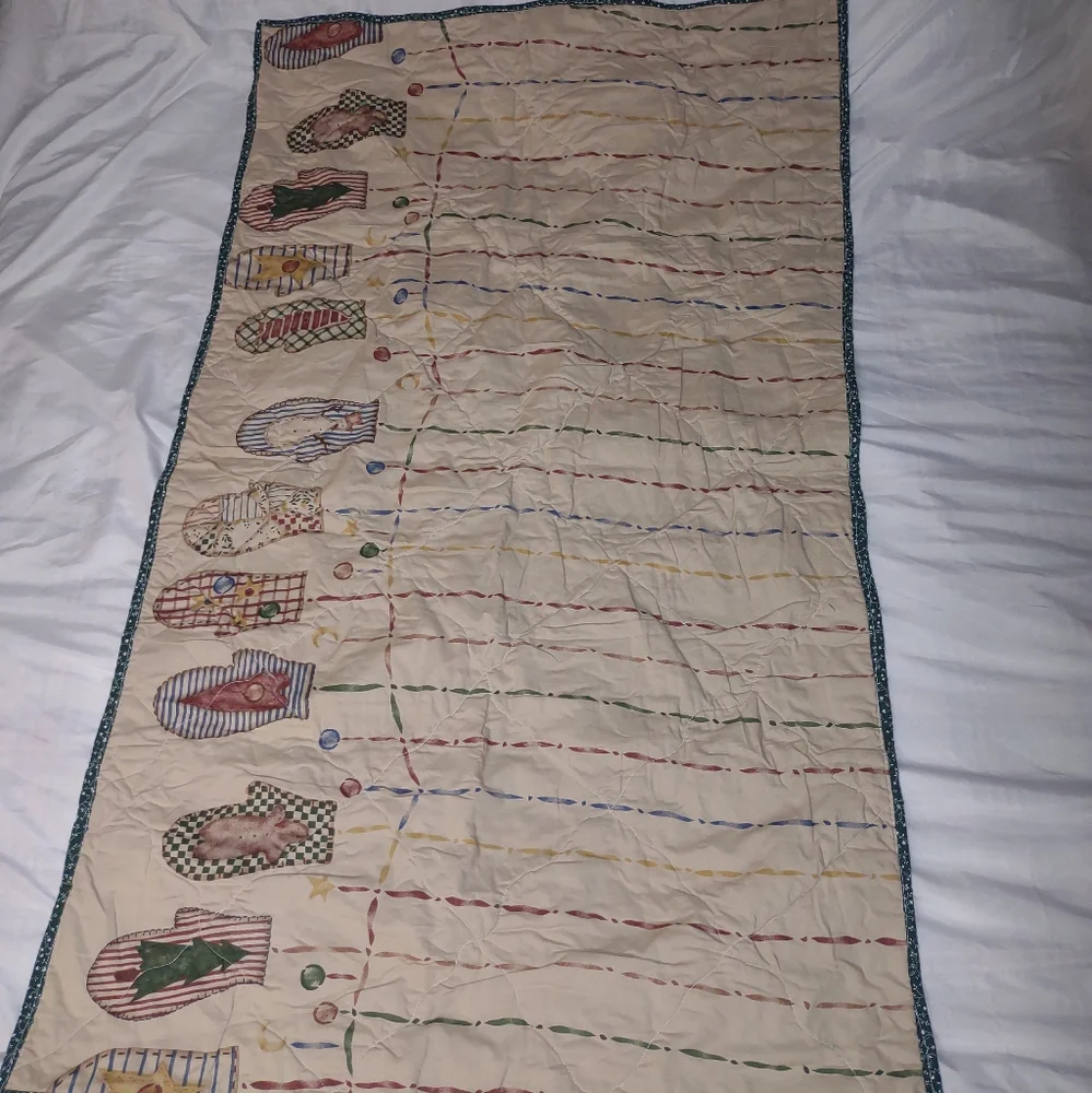 Festive Holiday Lap Quilt with Red, Green, and Blue Patterns